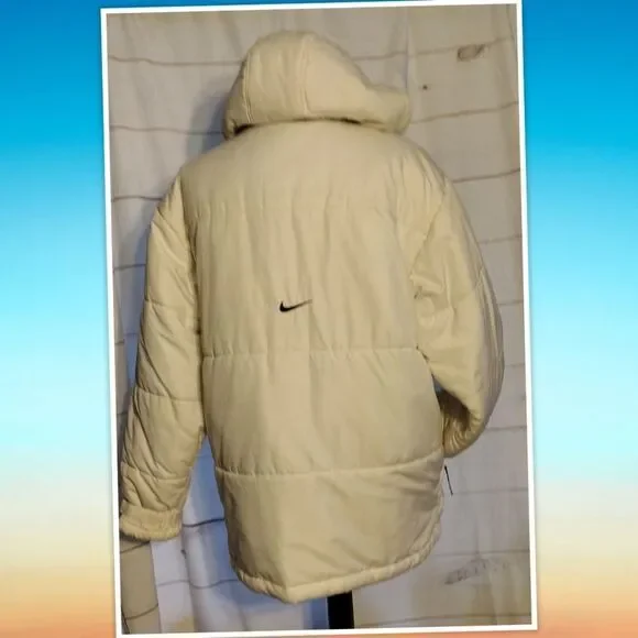 Nike insulated winter parka size small with removable hood and adjustable cuffes